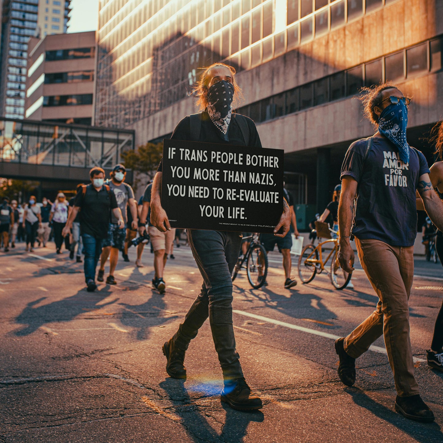 "Reevaluate" - protest & yard sign
